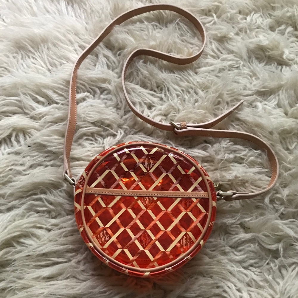 Libris Geometric Crossbody Bag in clear plastic with leather strap